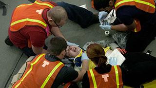 ems students in a simulation