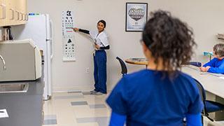 students practicing eye tests