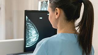 woman looking at a mammogrpahy